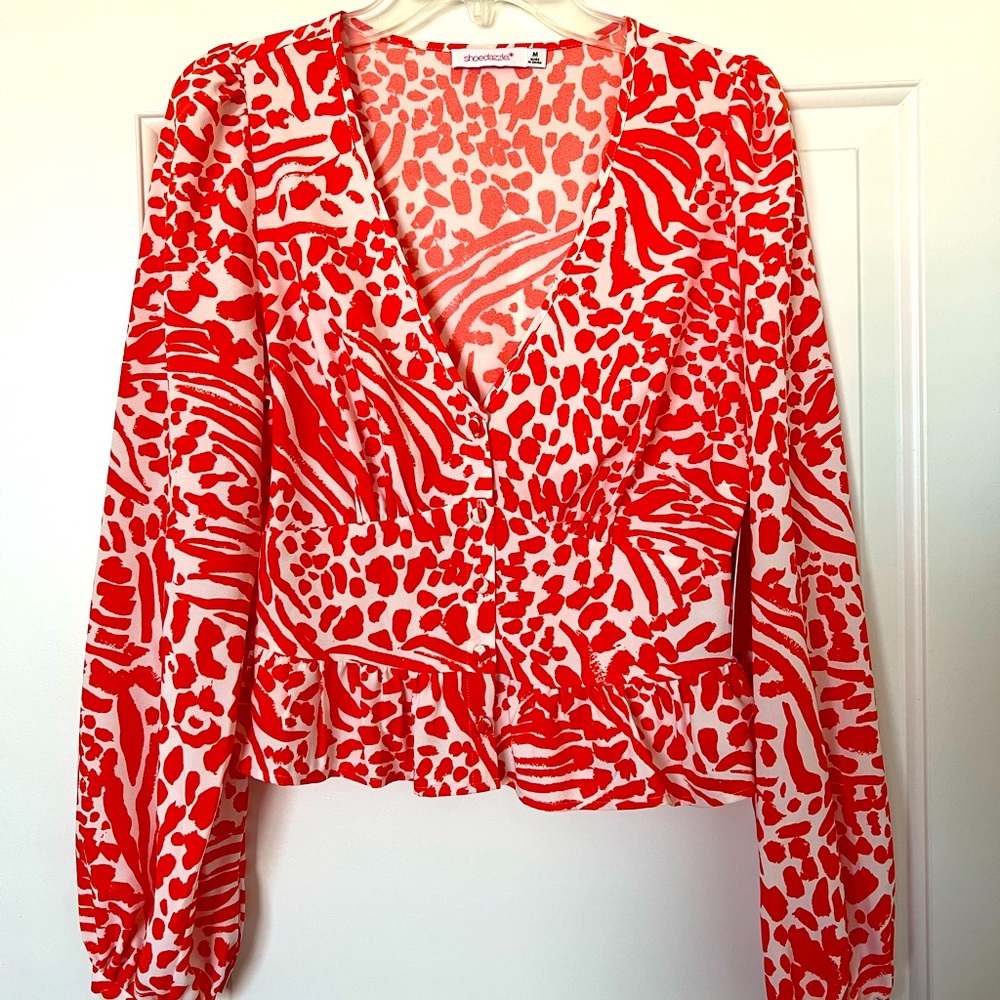 Long sleeved patterned blouse